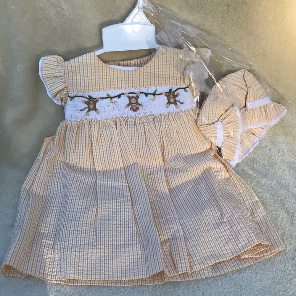 Smocked monkey Inset dress